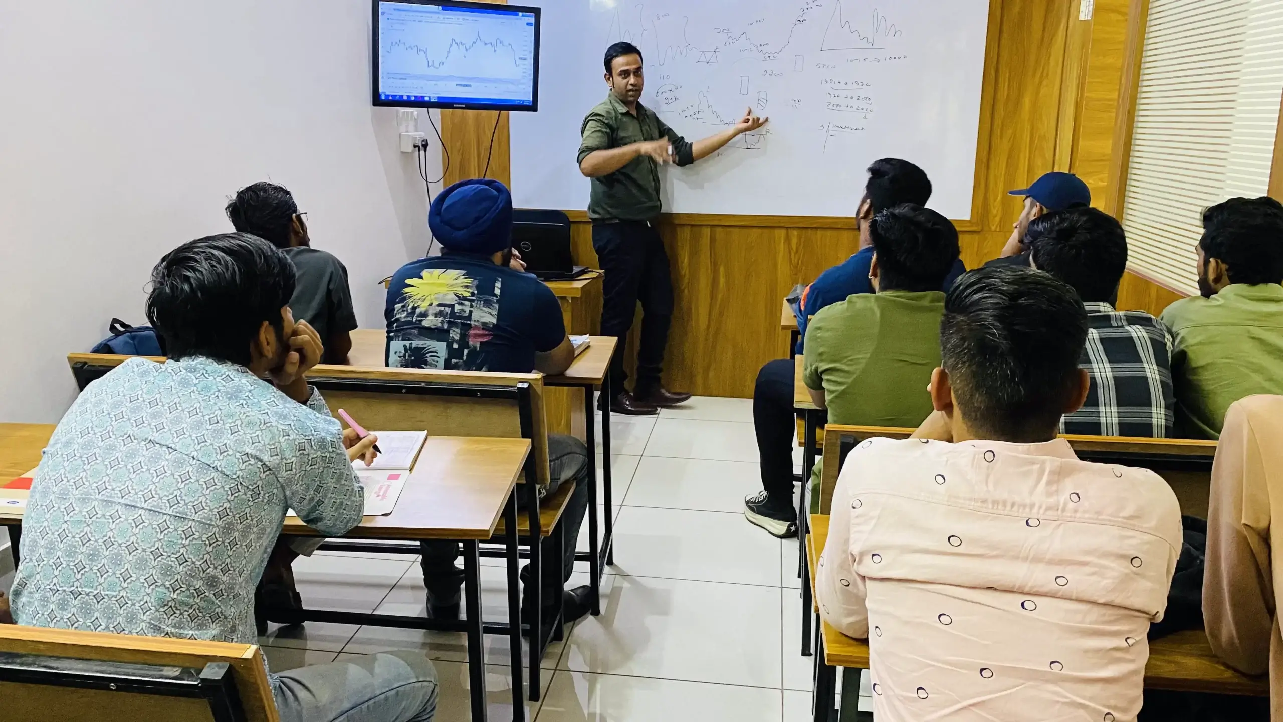 Classroom interaction during a stock market course in Udaipur